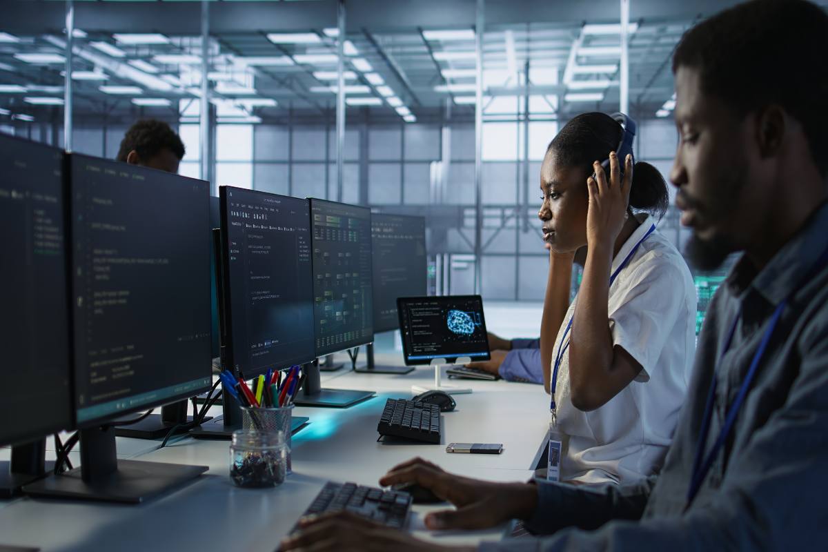 Confused person looking at cybersecurity terms on screen